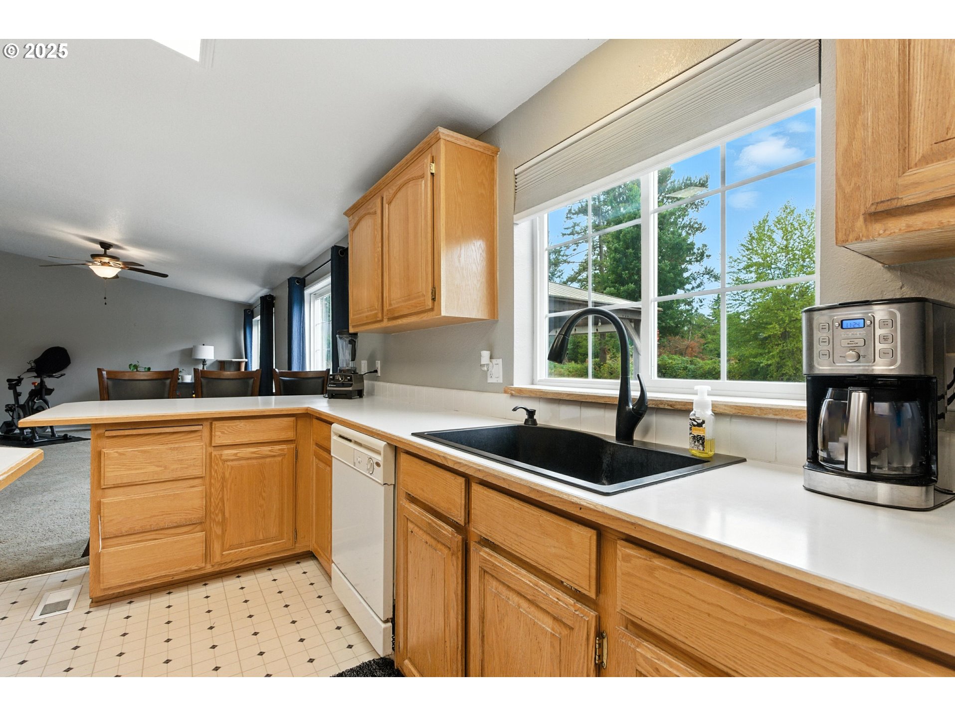 20160 Southeast Foster Road Damascus, OR 97089 - Photo 28 of 48 a kitchen with a sink and large window