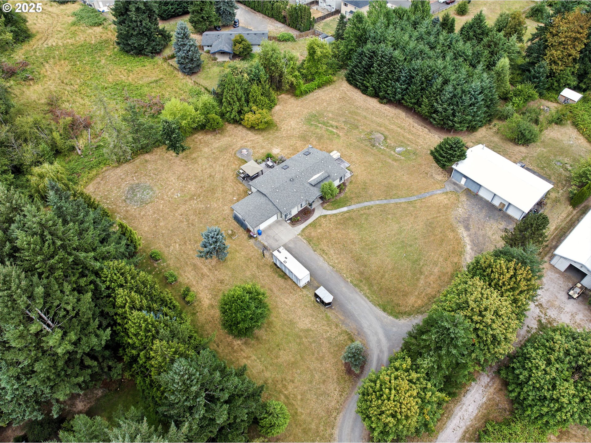 20160 Southeast Foster Road Damascus, OR 97089 - Photo 34 of 48 an aerial view of a house with a yard