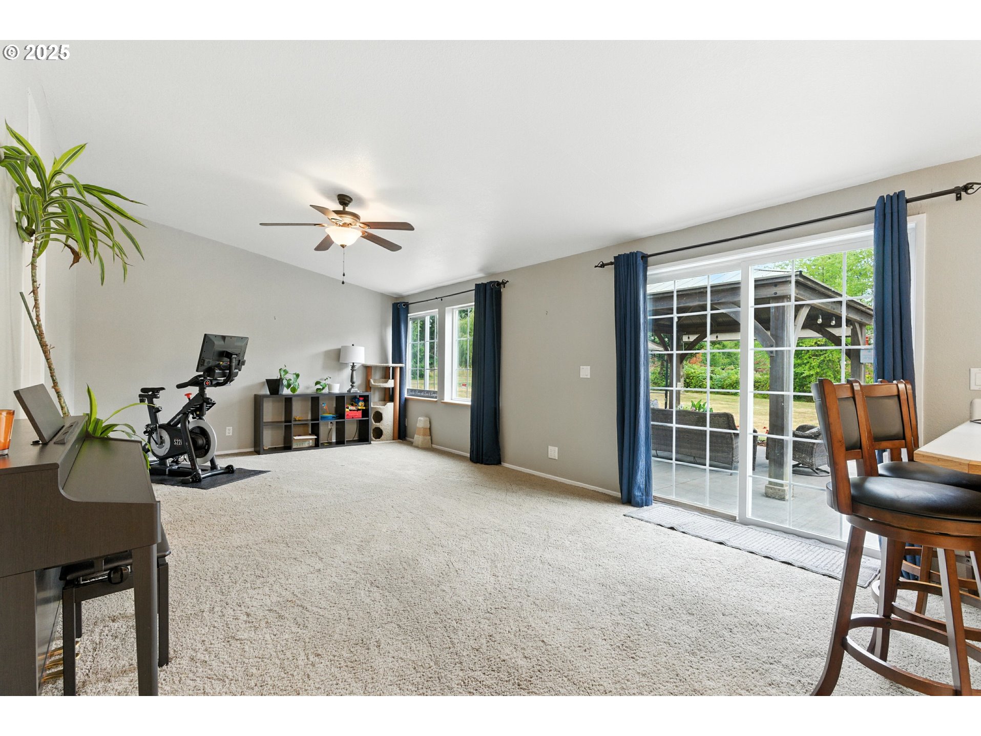 20160 Southeast Foster Road Damascus, OR 97089 - Photo 35 of 48 a view of a livingroom with furniture and a potted plant