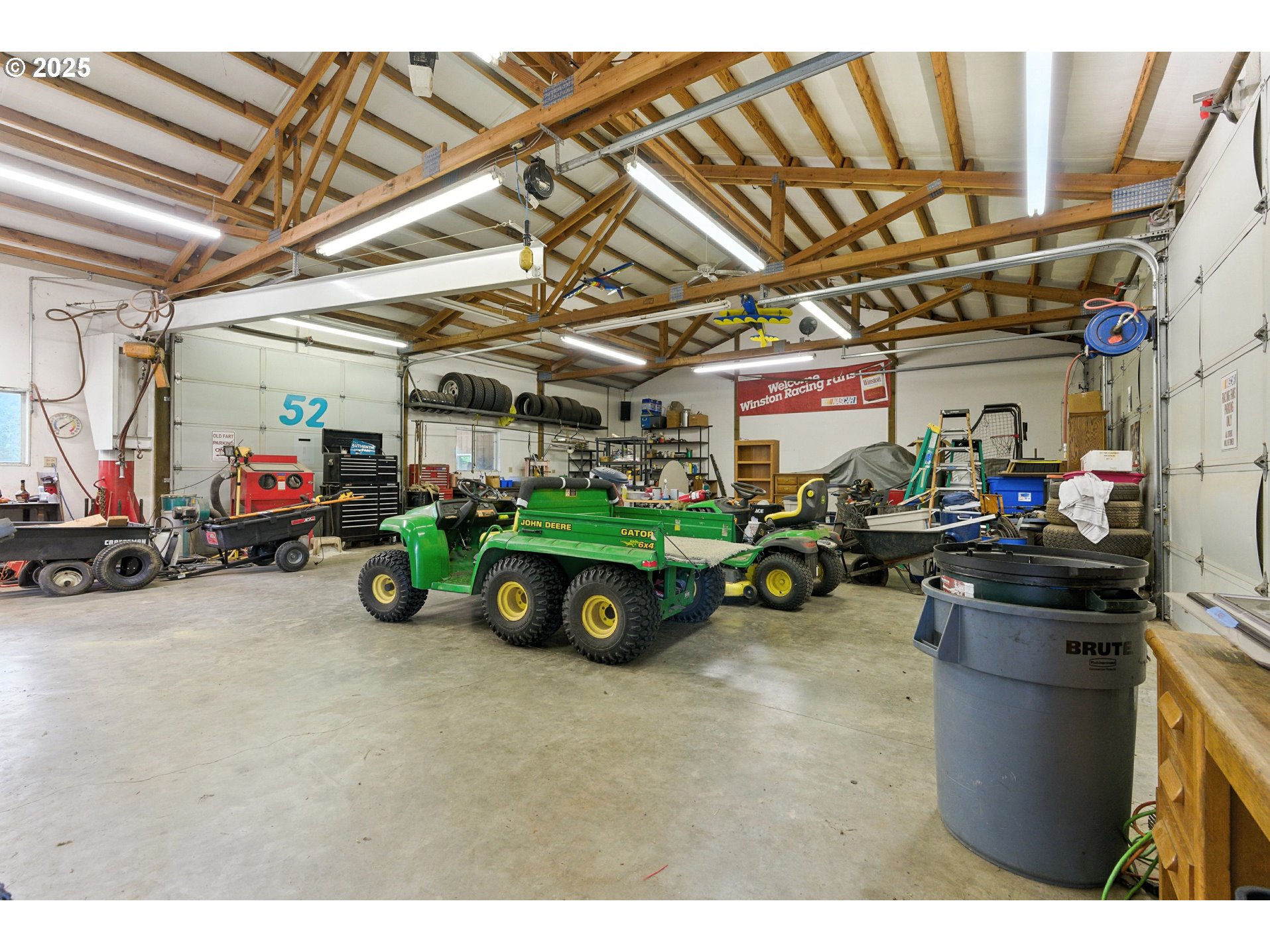 20160 Southeast Foster Road Damascus, OR 97089 - Photo 45 of 48 a view of parking garage with cars and other equipment