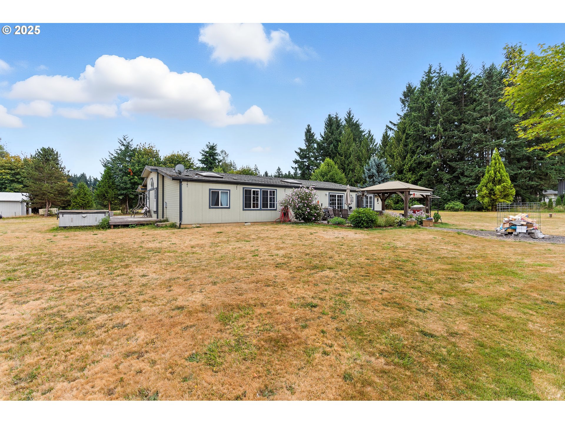 20160 Southeast Foster Road Damascus, OR 97089 - Photo 7 of 48 a view of a house with swimming pool