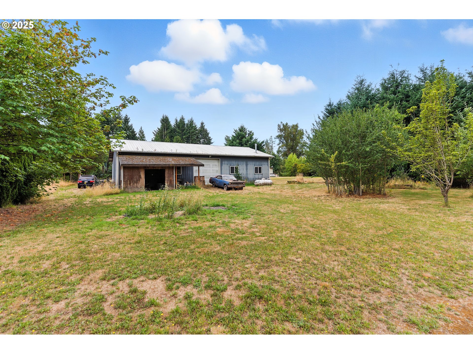 20160 Southeast Foster Road Damascus, OR 97089 - Photo 9 of 48 a view of a house with a yard