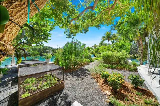 a view of a table and chairs in patio of the house