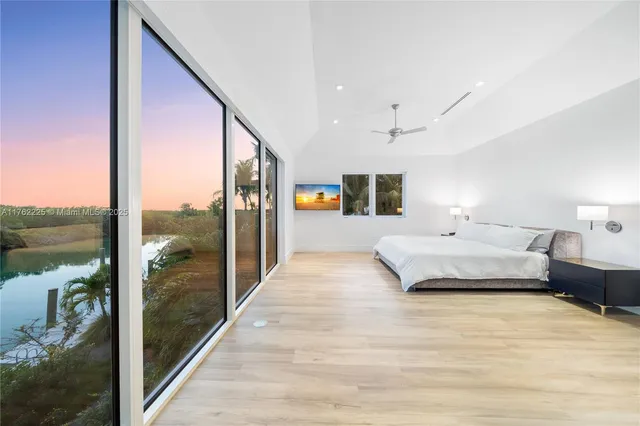 a view of a patio with couches and potted plants