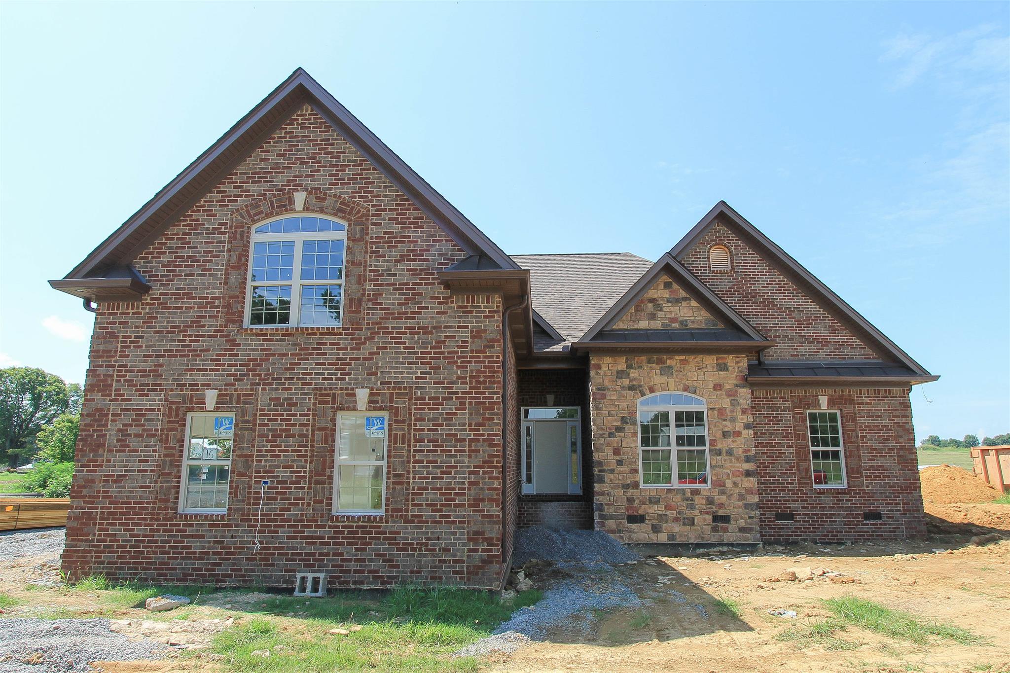 580 Academy Road, Unit 16 Lebanon, TN 37087 - Photo 1 of 3 a front view of a house with a yard