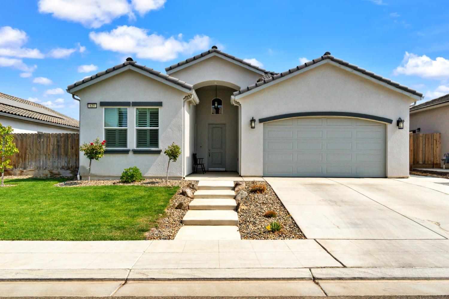 a front view of house with yard