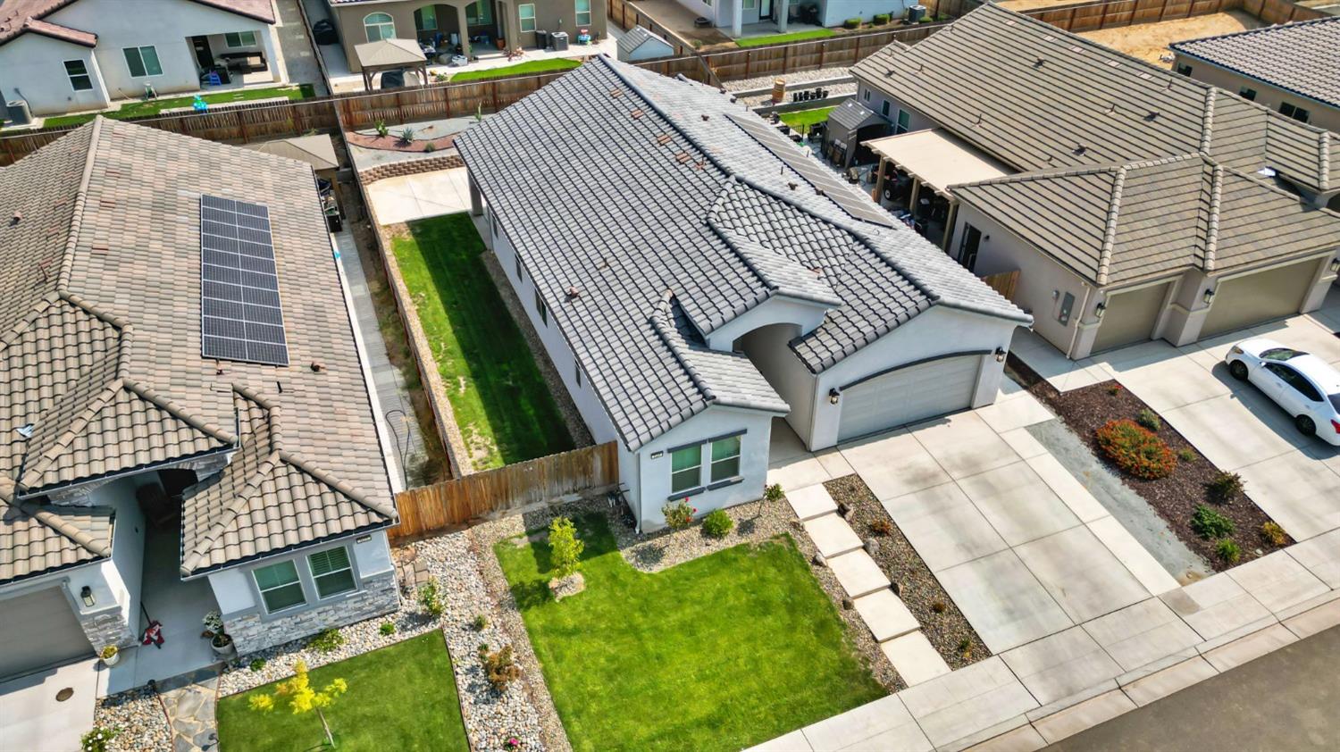 639 Mesa Drive Madera, CA 93636 - Photo 29 of 33 an aerial view of a house with a yard