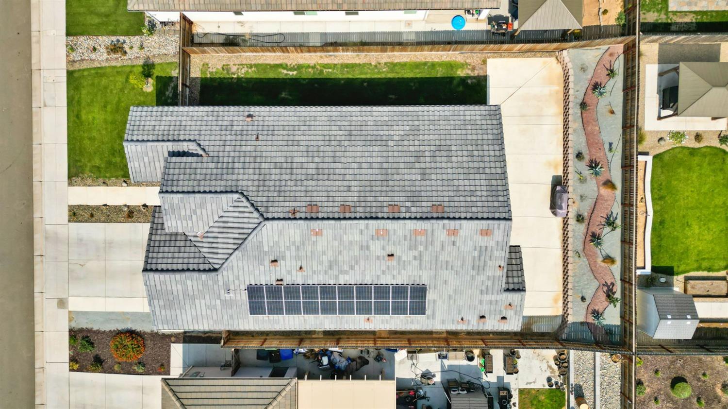 639 Mesa Drive Madera, CA 93636 - Photo 30 of 33 a bathroom with a sink and a mirror