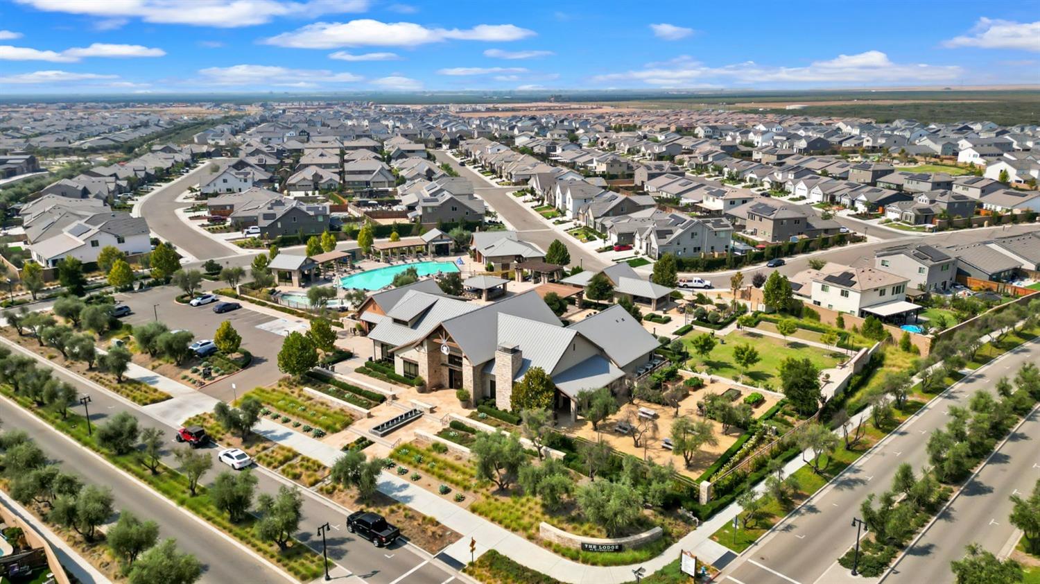 639 Mesa Drive Madera, CA 93636 - Photo 33 of 33 an aerial view of residential building with parking space