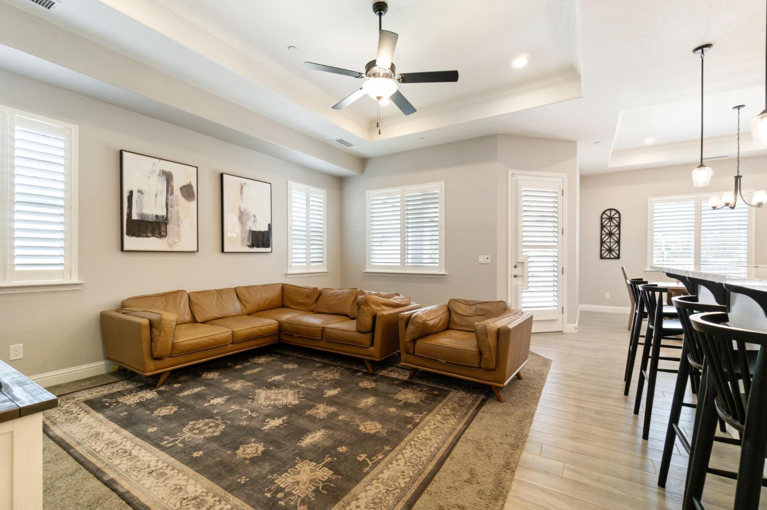 639 Mesa Drive Madera, CA 93636 - Photo 6 of 33 a living room with furniture ceiling fan and a rug
