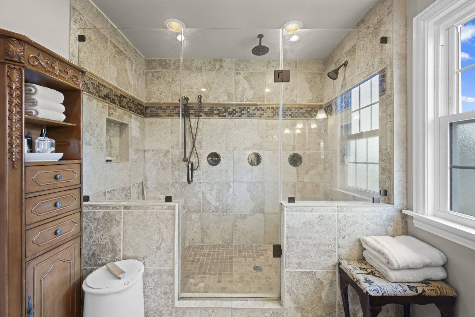 1565 Freeman Road Hoffman Estates, IL 60192 - Photo 31 of 46 a bathroom with a shower a sink and mirror