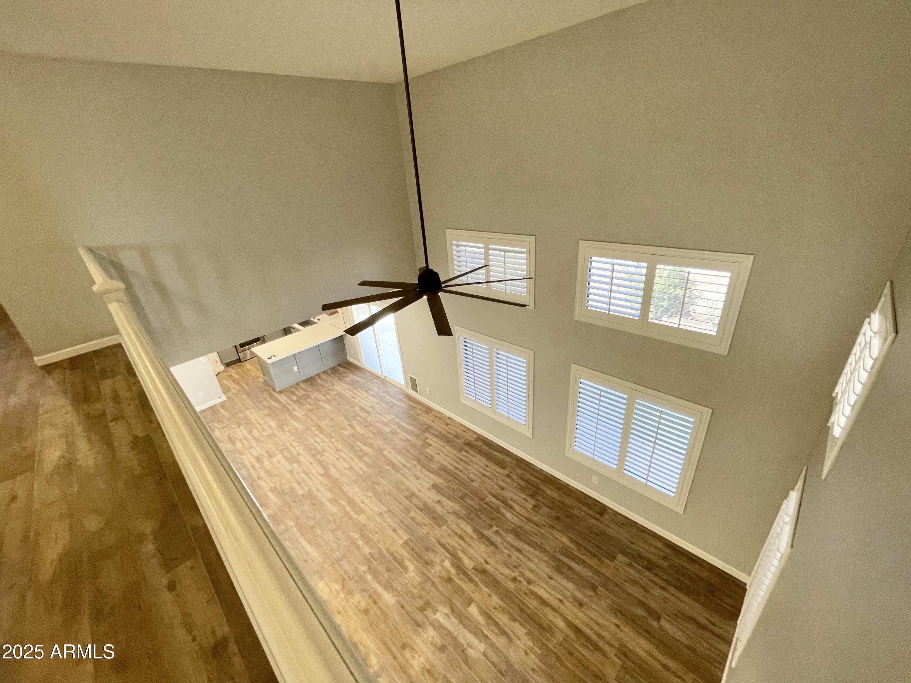 2640 East Indian Wells Place Chandler, AZ 85249 - Photo 16 of 40 a bedroom with a bed and a window