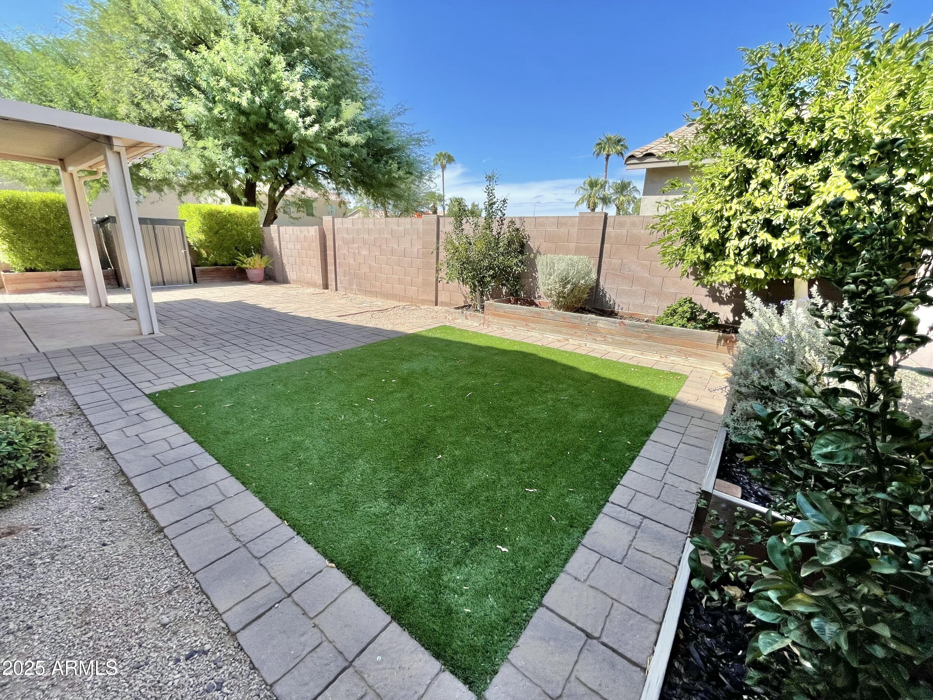 2640 East Indian Wells Place Chandler, AZ 85249 - Photo 35 of 40 a view of a back yard