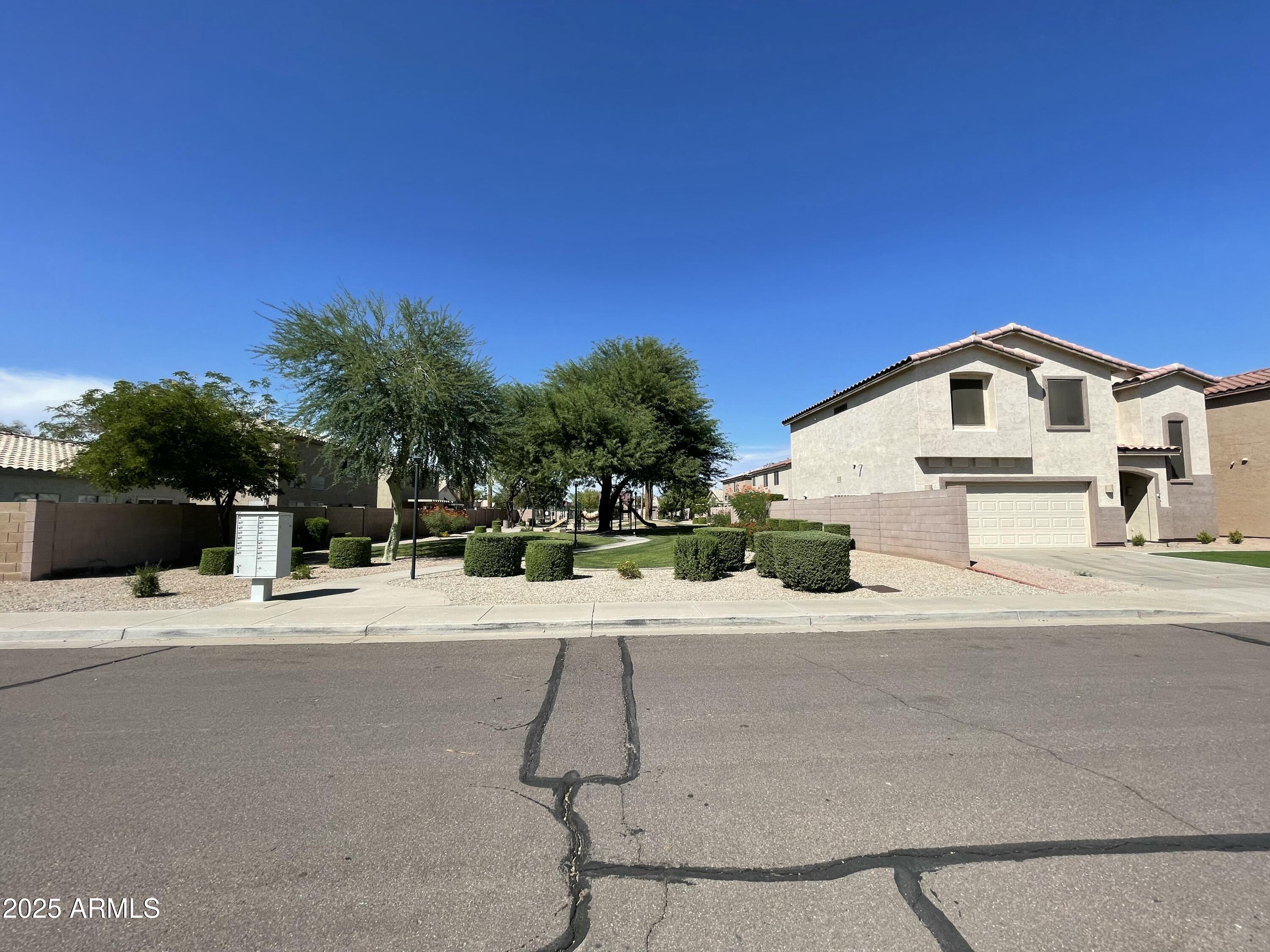 2640 East Indian Wells Place Chandler, AZ 85249 - Photo 39 of 40 a white house with a outdoor space