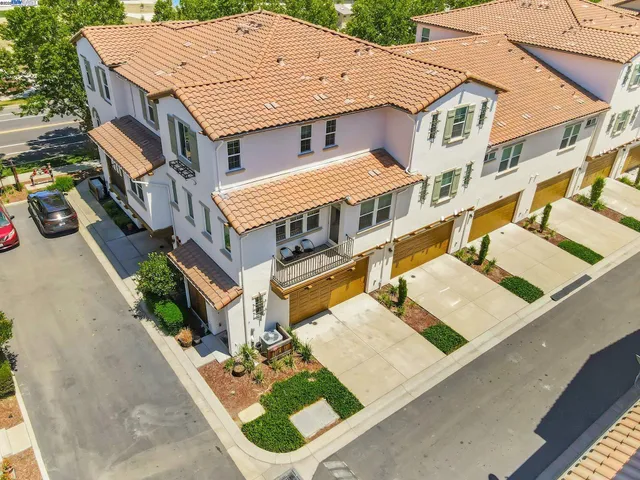 a aerial view of a house with a patio