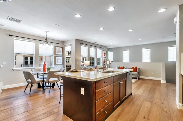 a view of a kitchen and dining room