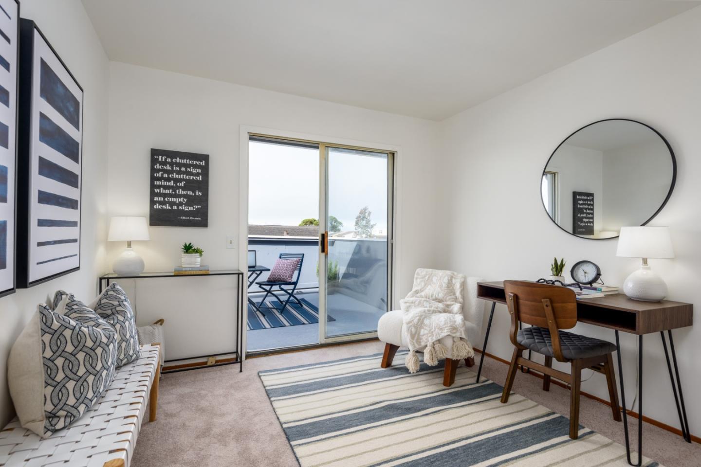1029 Suzanne Court Half Moon Bay, CA 94019 - Photo 15 of 25 a living room with furniture and a large mirror next to a window
