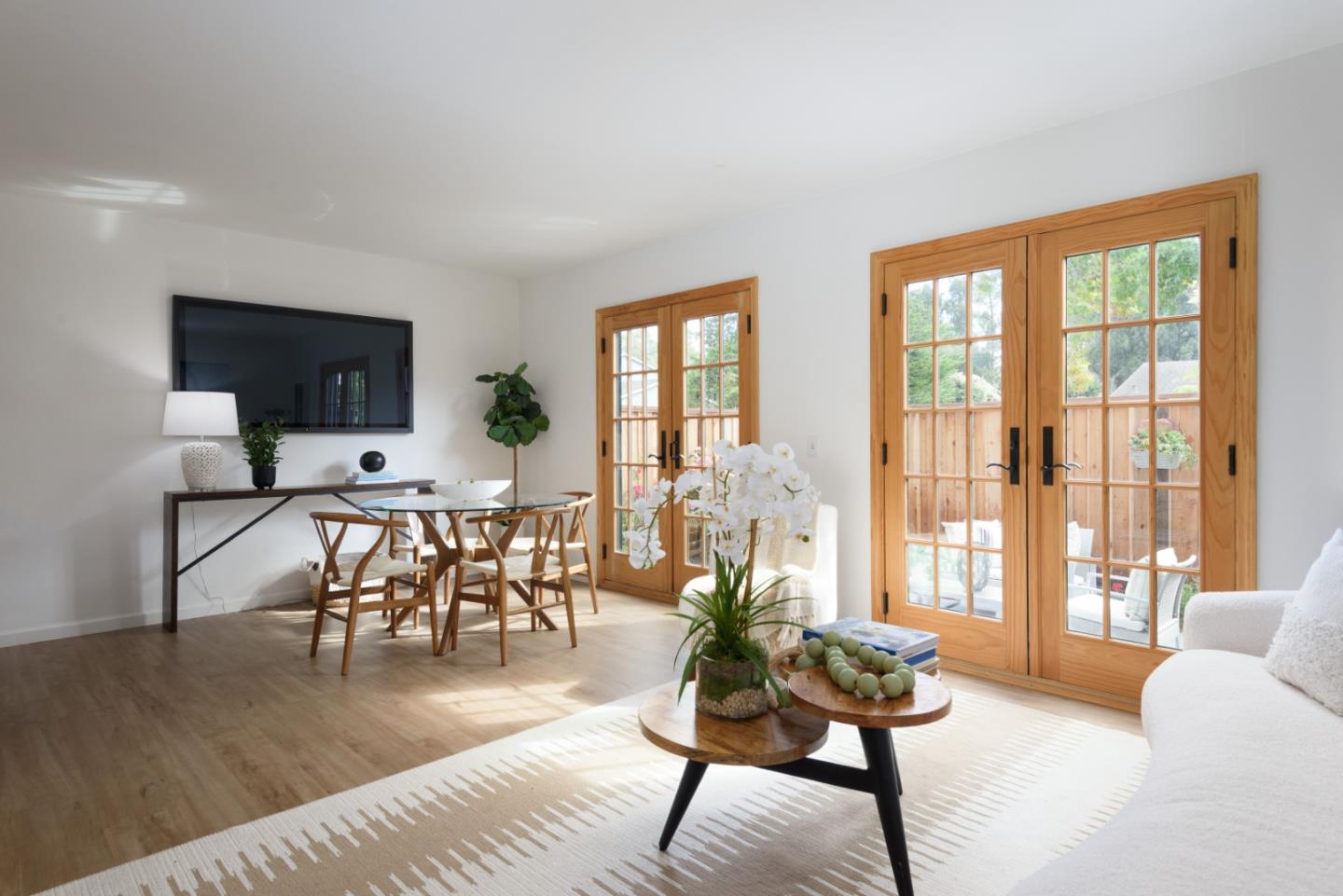 1029 Suzanne Court Half Moon Bay, CA 94019 - Photo 2 of 25 a living room with furniture and a flat screen tv