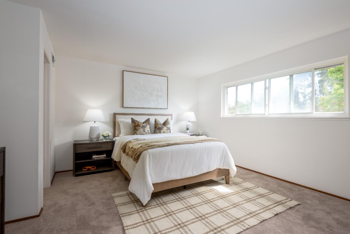 1029 Suzanne Court Half Moon Bay, CA 94019 - Photo 10 of 25 a bedroom with a bed and a window