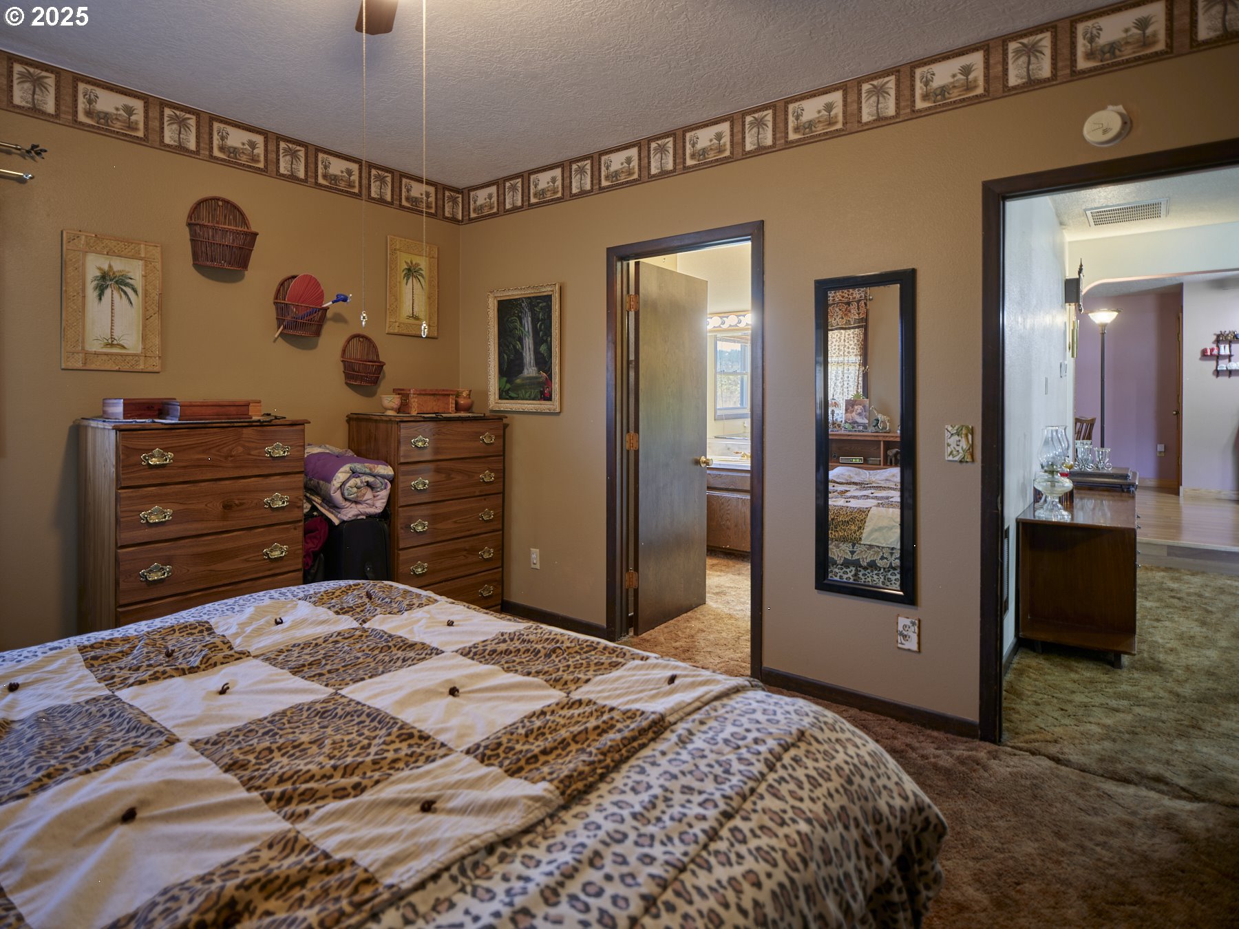 115 Whalen Loop Road Woodland, WA 98674 - Photo 20 of 40 a bedroom with a bed and a dresser