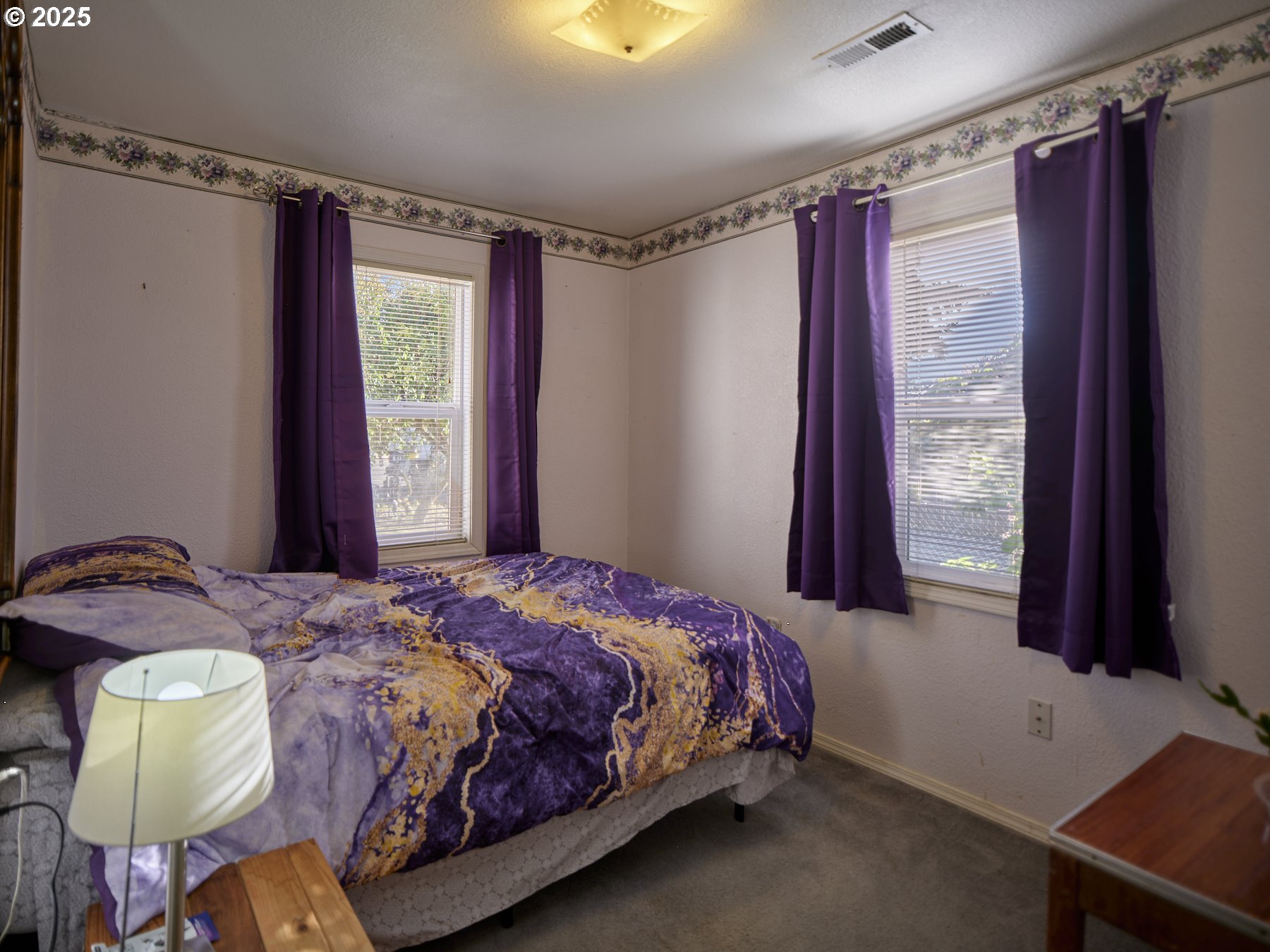 115 Whalen Loop Road Woodland, WA 98674 - Photo 24 of 40 a bedroom with a bed and a window