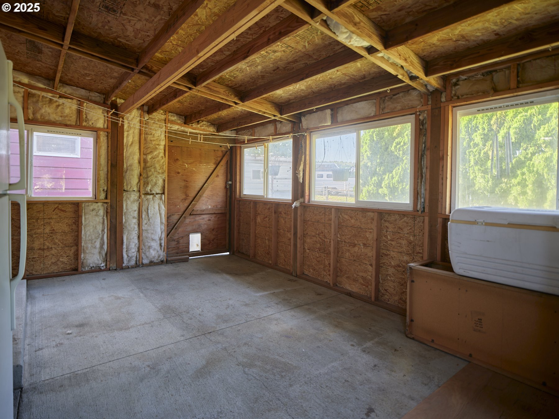115 Whalen Loop Road Woodland, WA 98674 - Photo 28 of 40 a view of an empty room with a window
