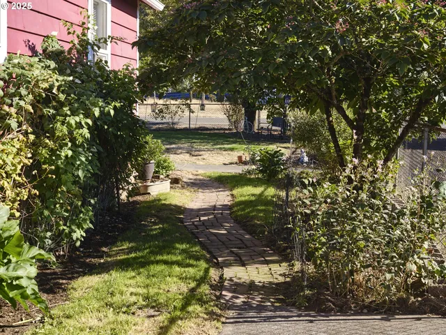 a view of a yard with an trees