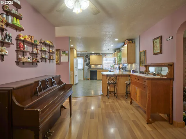a kitchen with a sink cabinets and window