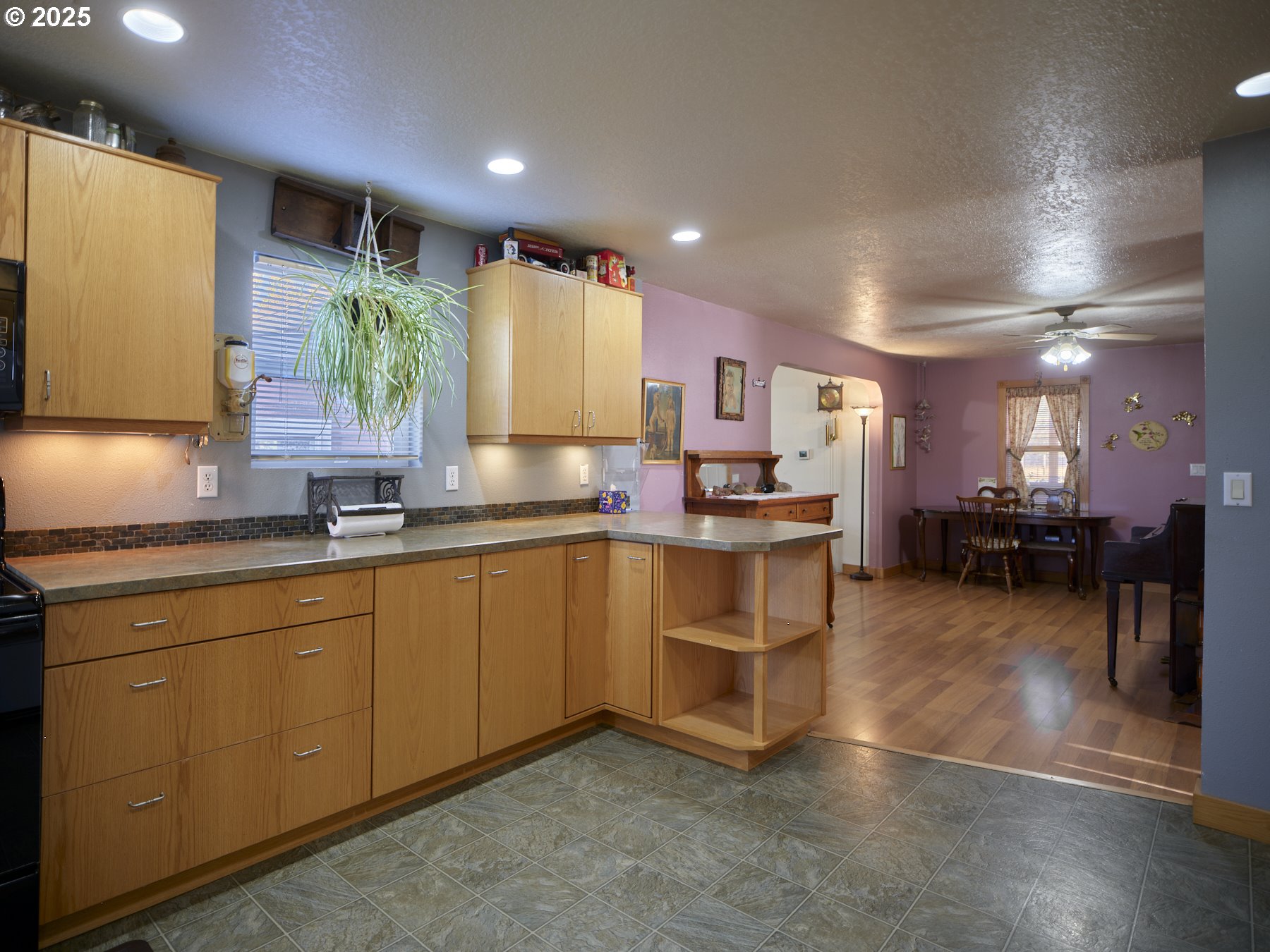 115 Whalen Loop Road Woodland, WA 98674 - Photo 8 of 40 a kitchen with a sink cabinets and window