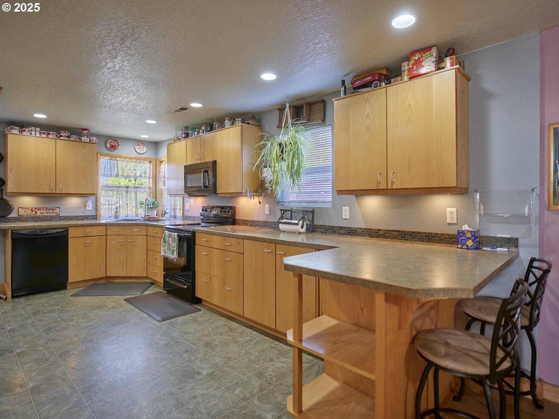 115 Whalen Loop Road Woodland, WA 98674 - Photo 9 of 40 a kitchen with a sink cabinets and window