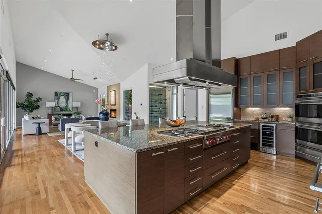 a kitchen with a stove and a table