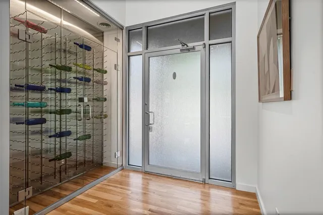 a bathroom with a glass shower door