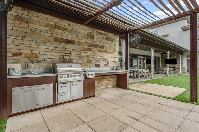 a view of a swimming pool with a patio