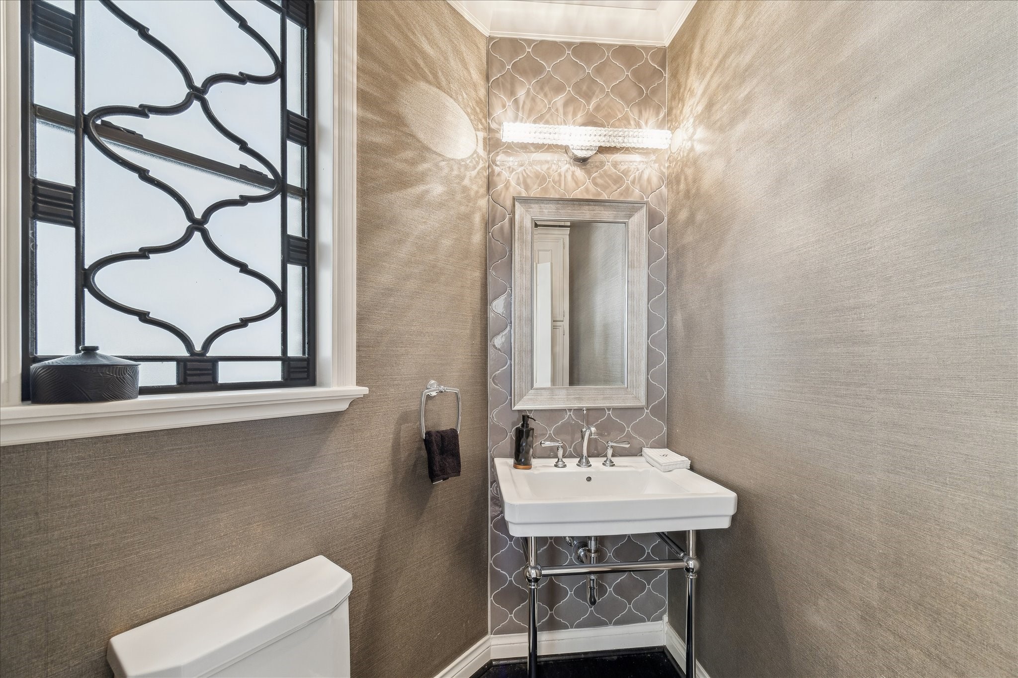 6787 Monarda Court Houston, TX 77069 - Photo 14 of 33 a bathroom with a sink a toilet and a mirror