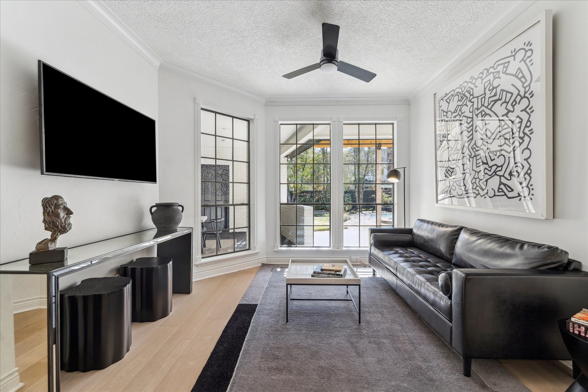 6787 Monarda Court Houston, TX 77069 - Photo 8 of 33 a living room with furniture and a flat screen tv