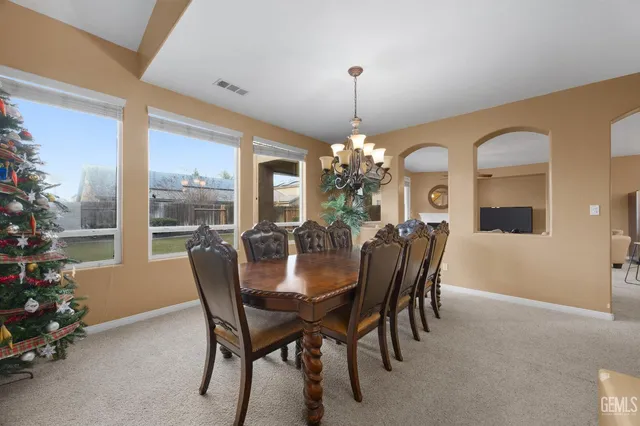 a view of a dining room with furniture