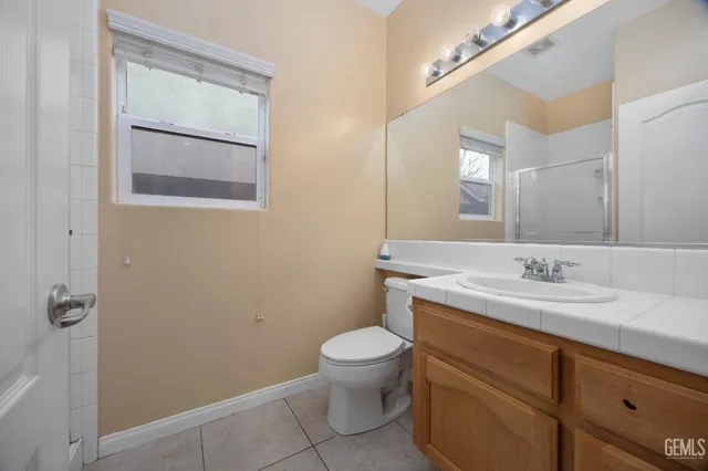 a bathroom with a bathtub sink and a shower
