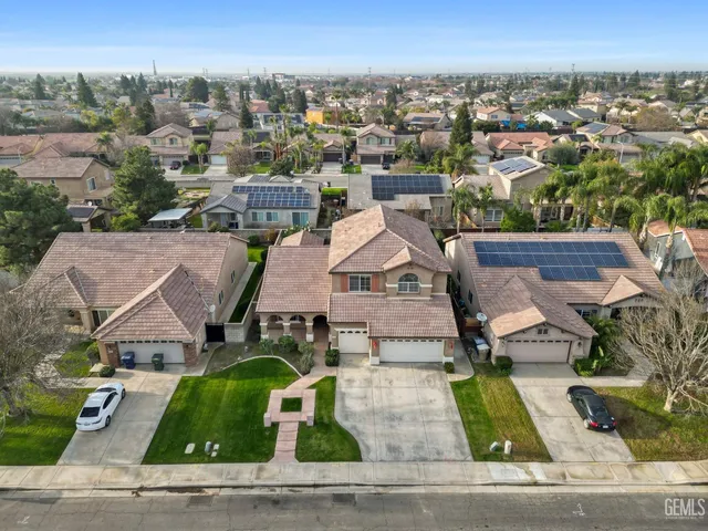 an aerial view of a house with a garden
