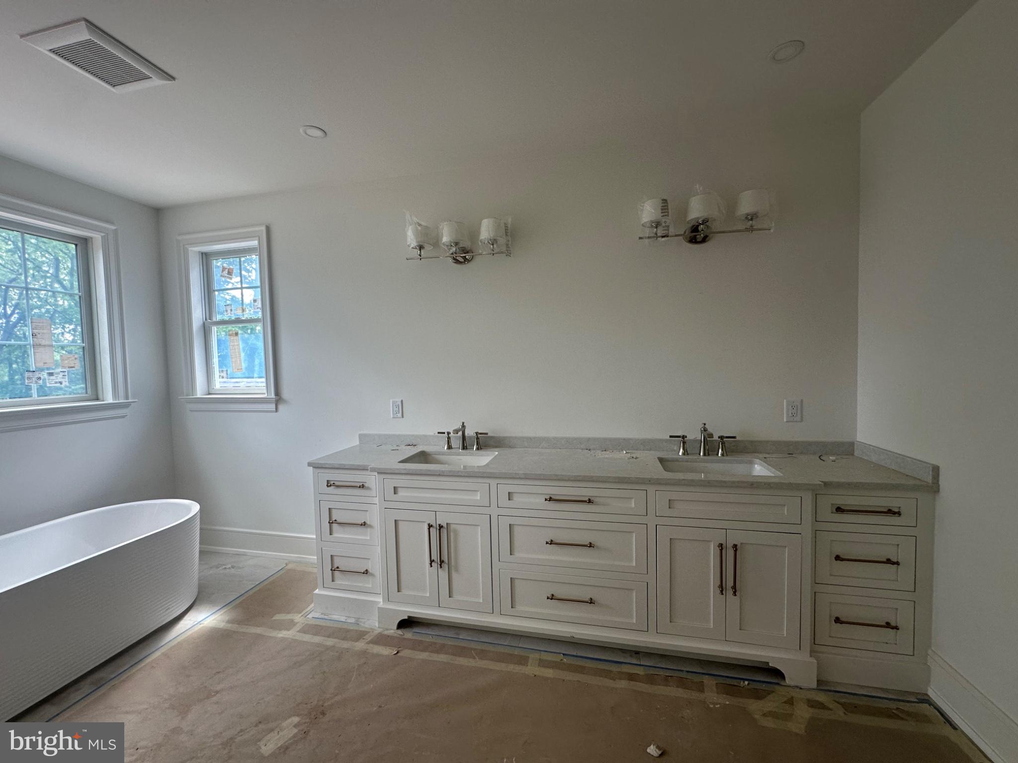 353 Oak Terrace Wayne, PA 19087 - Photo 9 of 13 a bathroom with a granite countertop sink and a mirror