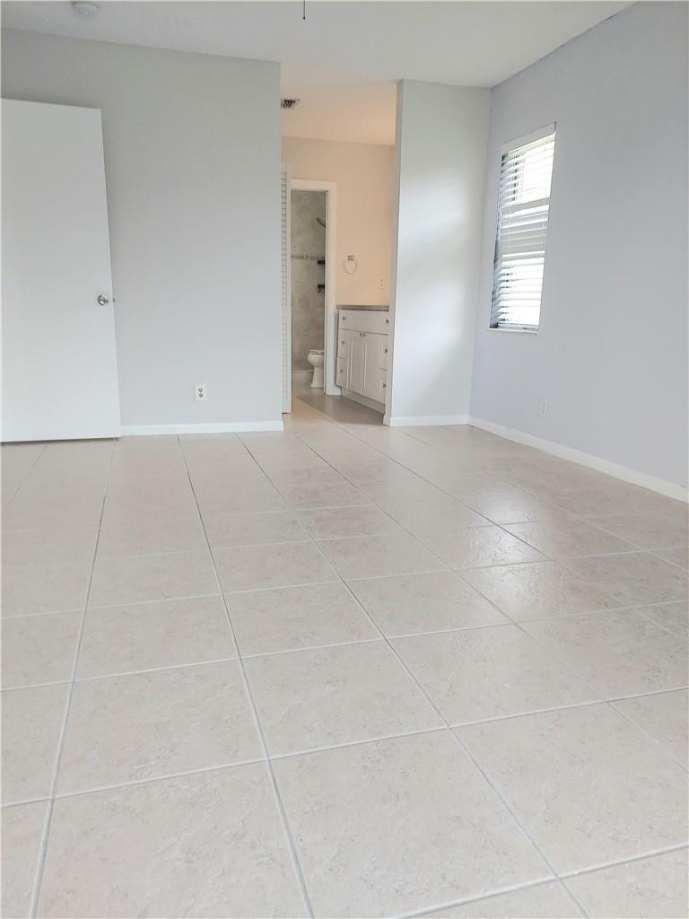 9875 Three Lakes Circle, Unit 8A Boca Raton, FL 33428 - Photo 9 of 33 Photo 9