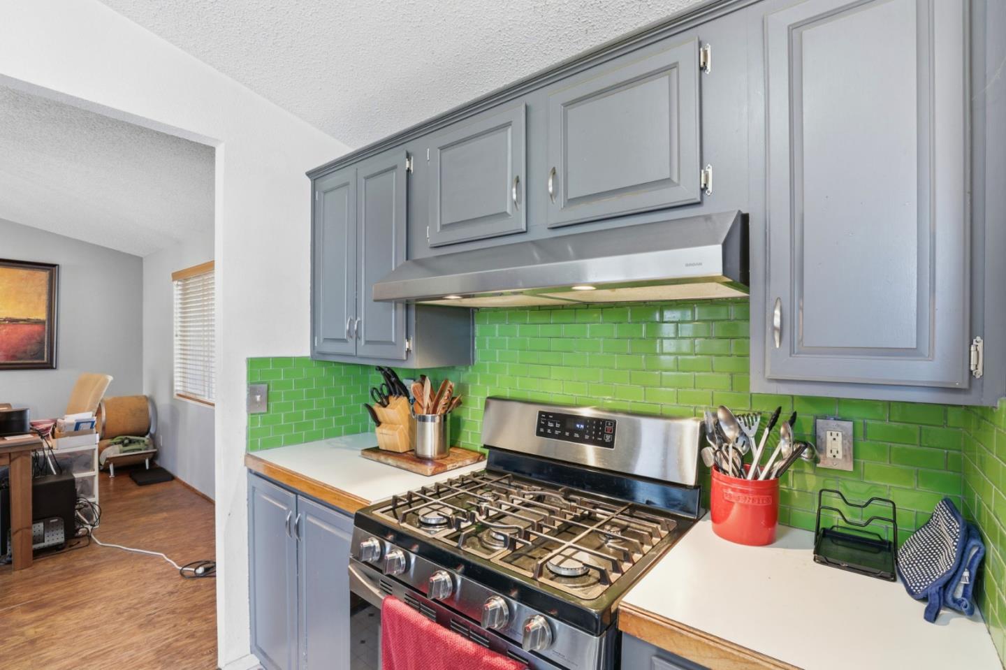 20 Russell Road, Unit 8 Salinas, CA 93906 - Photo 10 of 38 a kitchen with a stove and a microwave