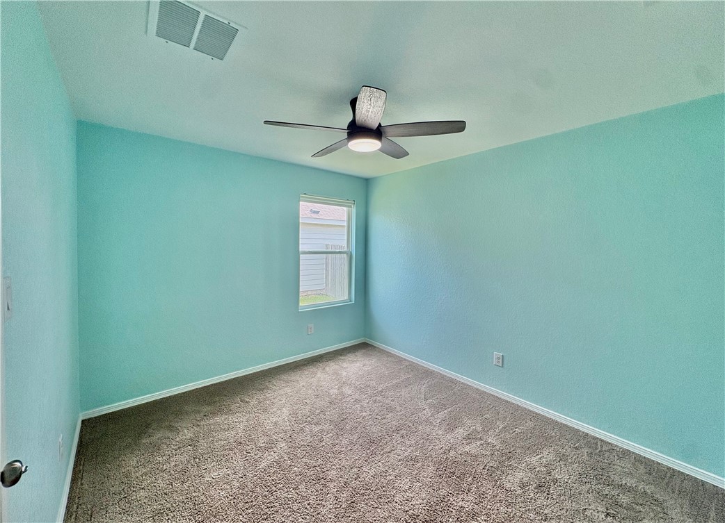1109 Demeter Drive Portland, TX 78374 - Photo 16 of 18 a view of a room that has a window in it