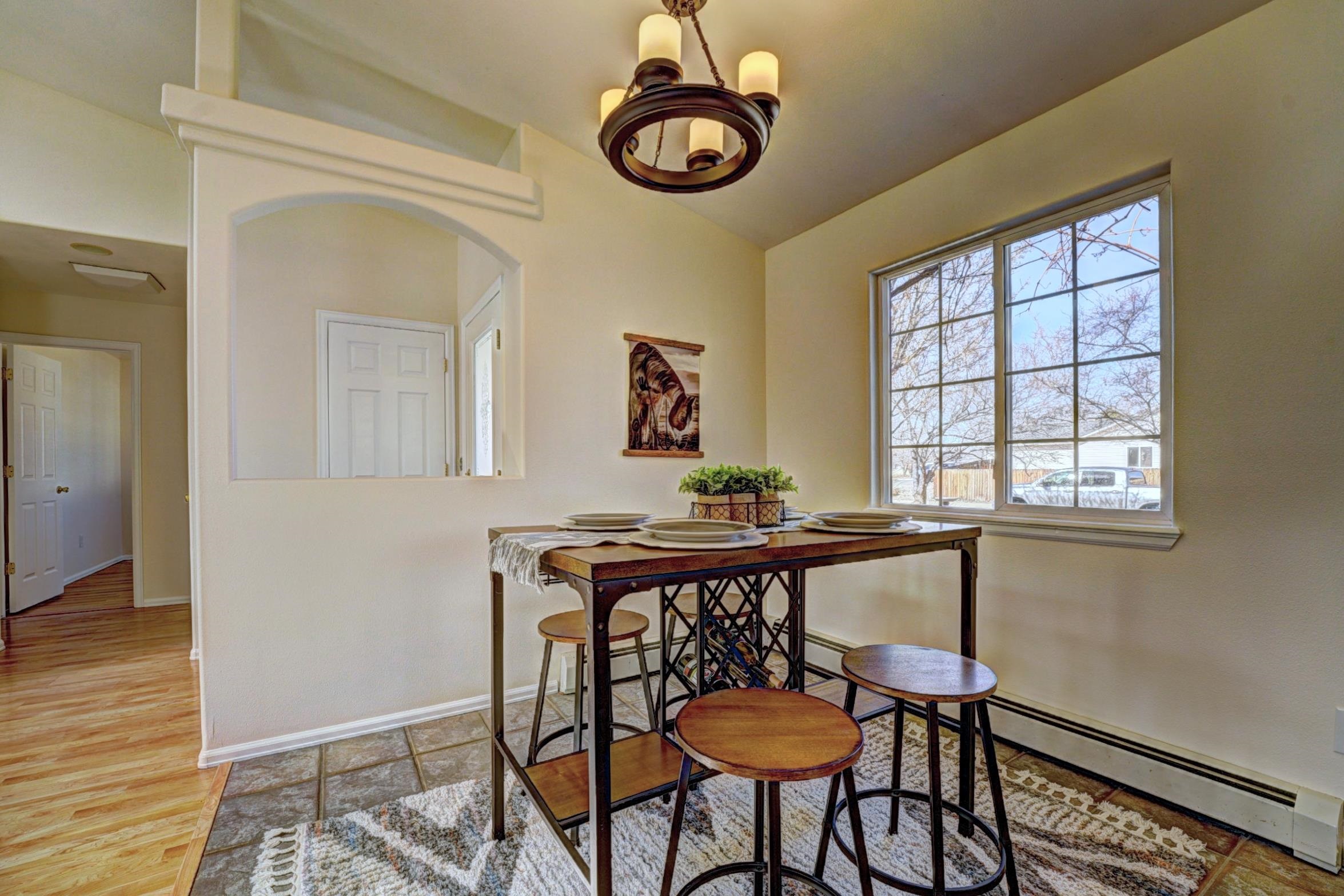 1460 Powell Street Fruita, CO 81521 - Photo 12 of 35 a view of a room that has a table and chair