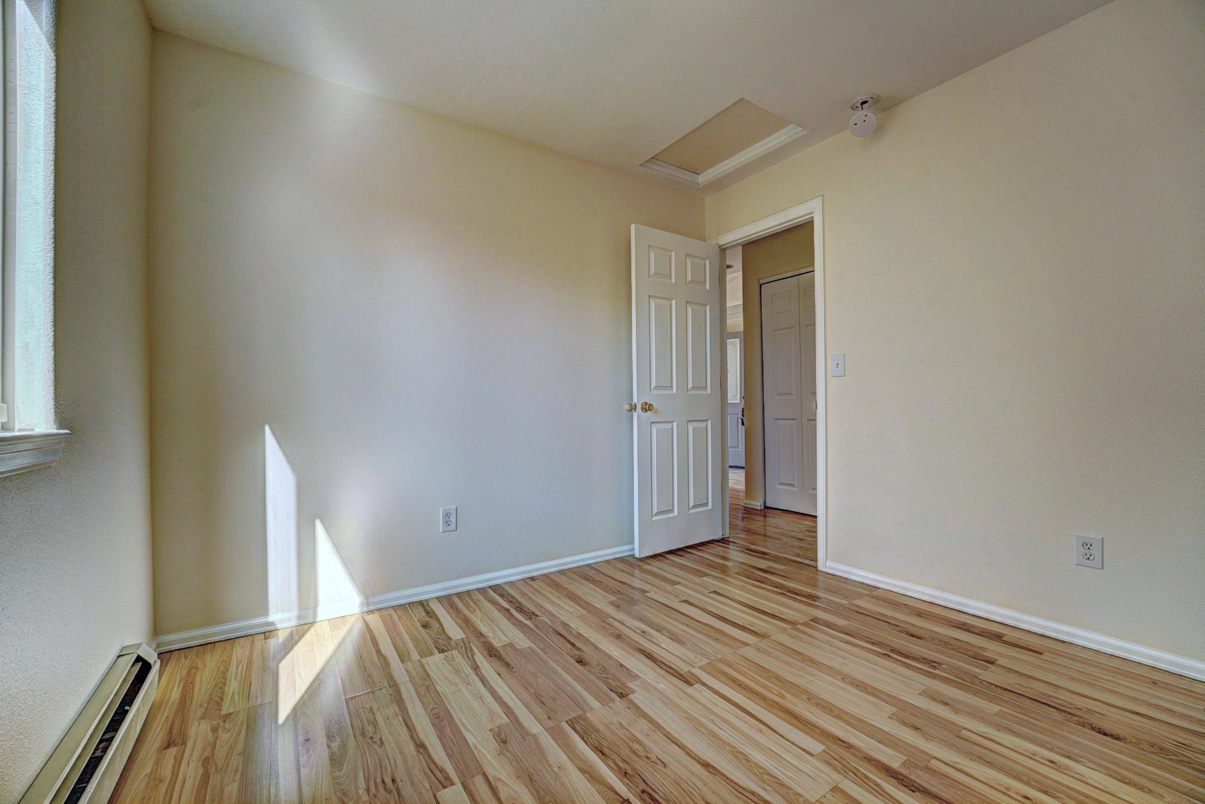 1460 Powell Street Fruita, CO 81521 - Photo 30 of 35 a view of empty room with wooden floor