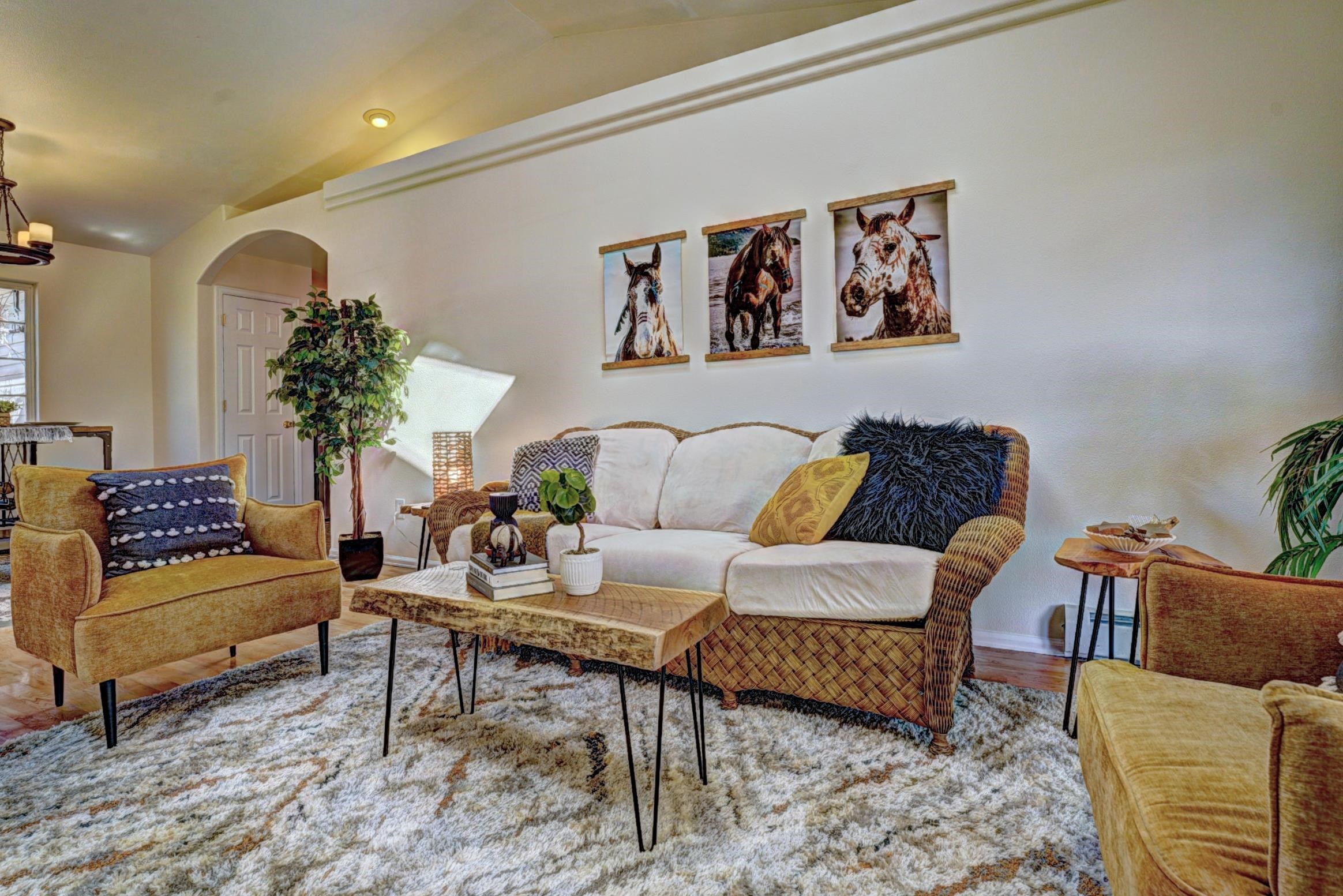 1460 Powell Street Fruita, CO 81521 - Photo 6 of 35 a living room with furniture and wooden floor