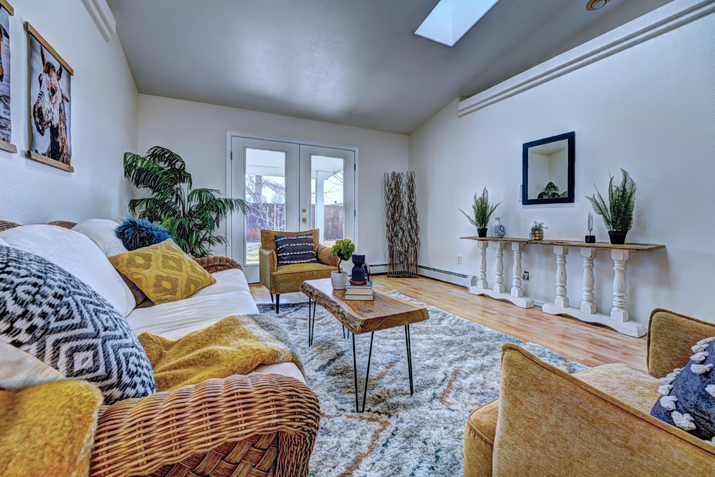 1460 Powell Street Fruita, CO 81521 - Photo 10 of 35 a living room with furniture and wooden floor