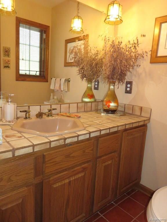 2673 Brighton Road Howell, MI 48843 - Photo 11 of 62 Tile floor & counter top Powder Room