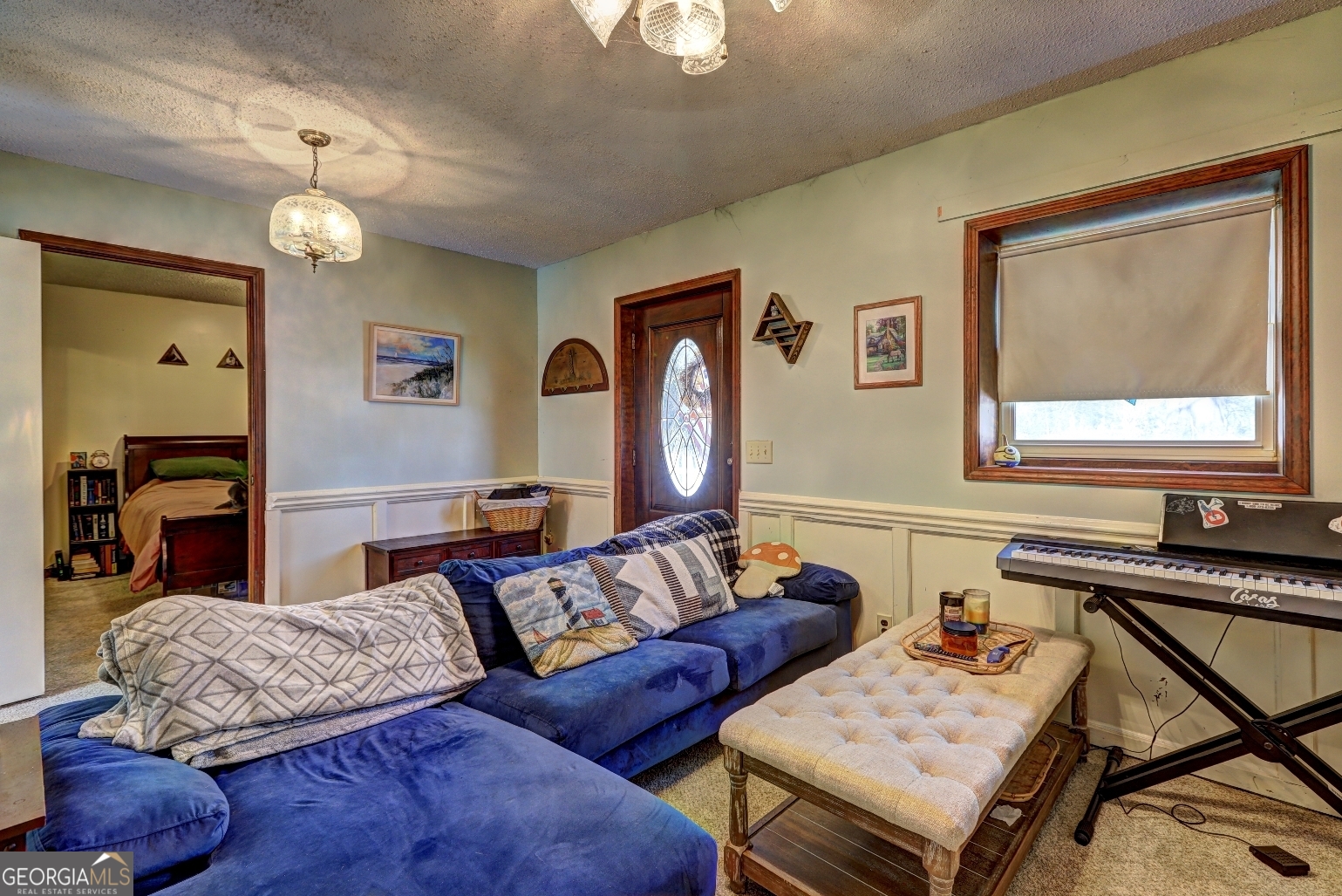 205 Highway 186, Unit TRACT 1 Good Hope, GA 30641 - Photo 14 of 28 a living room with furniture and a window