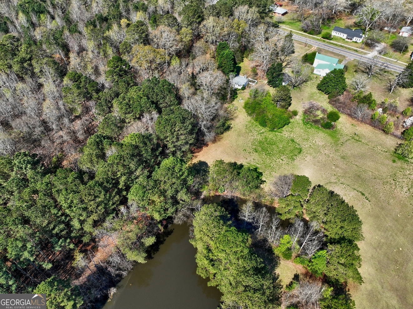 205 Highway 186, Unit TRACT 1 Good Hope, GA 30641 - Photo 22 of 28 an aerial view of residential house with outdoor space and trees all around