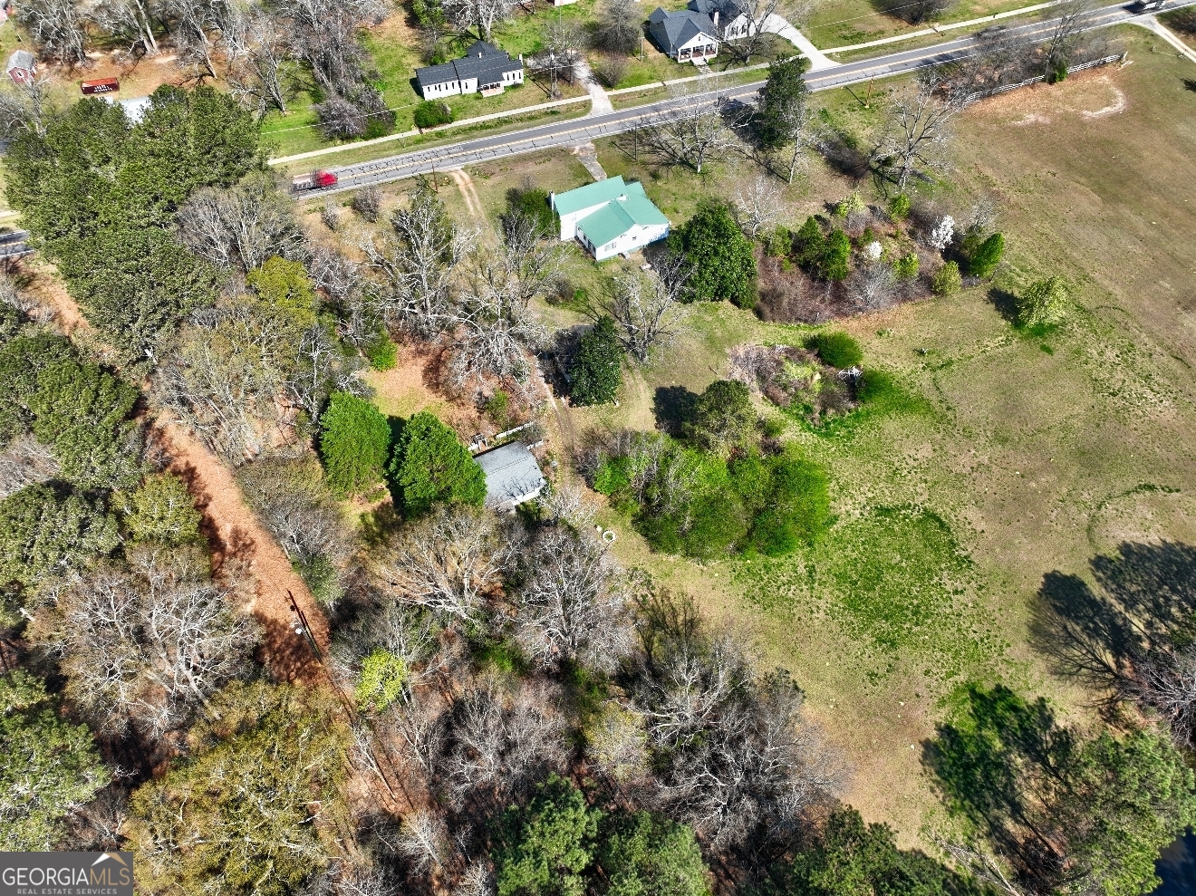 205 Highway 186, Unit TRACT 1 Good Hope, GA 30641 - Photo 24 of 28 a view of a garden with a tree